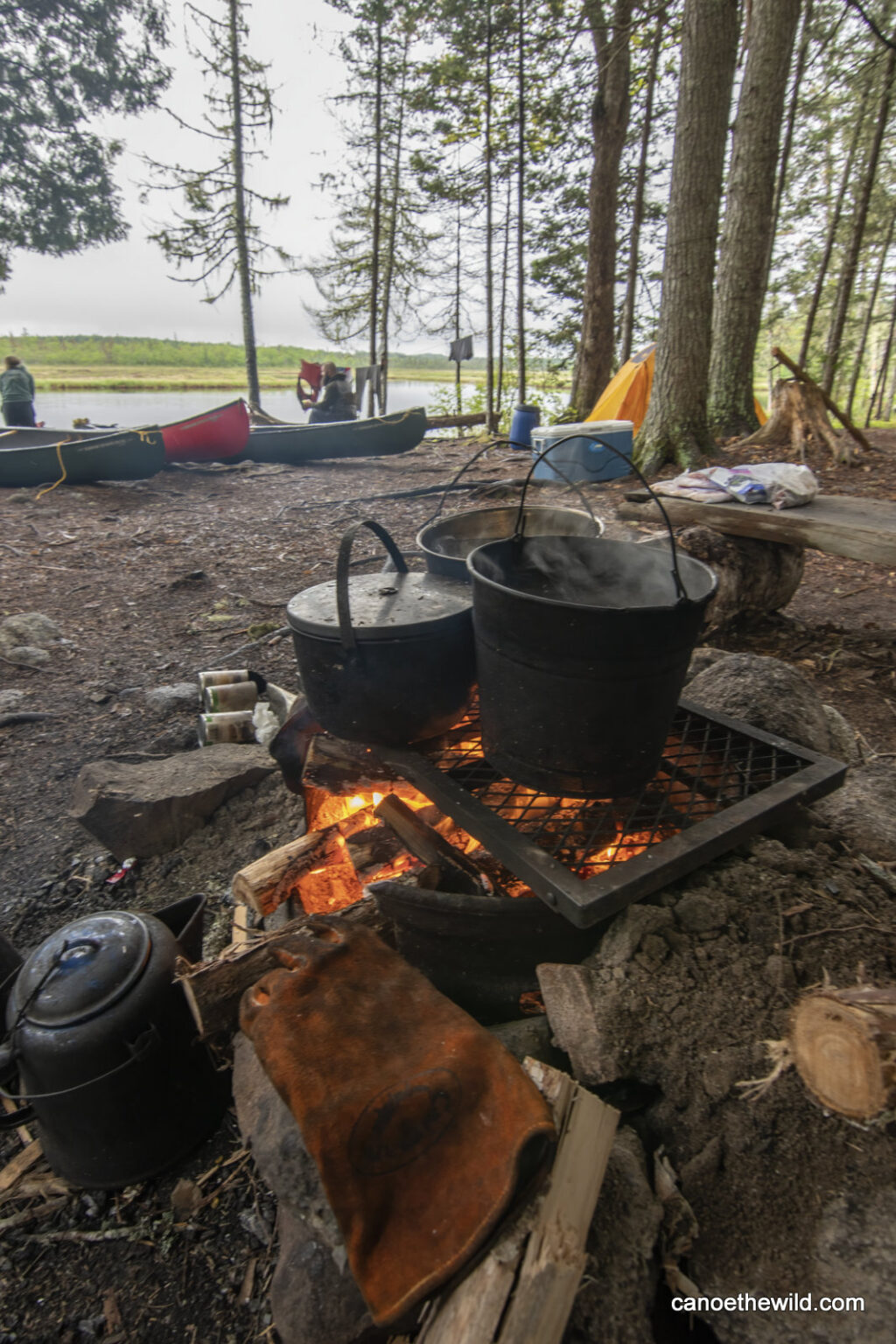 Canoe trip cooking over open fire Canoe the Wild